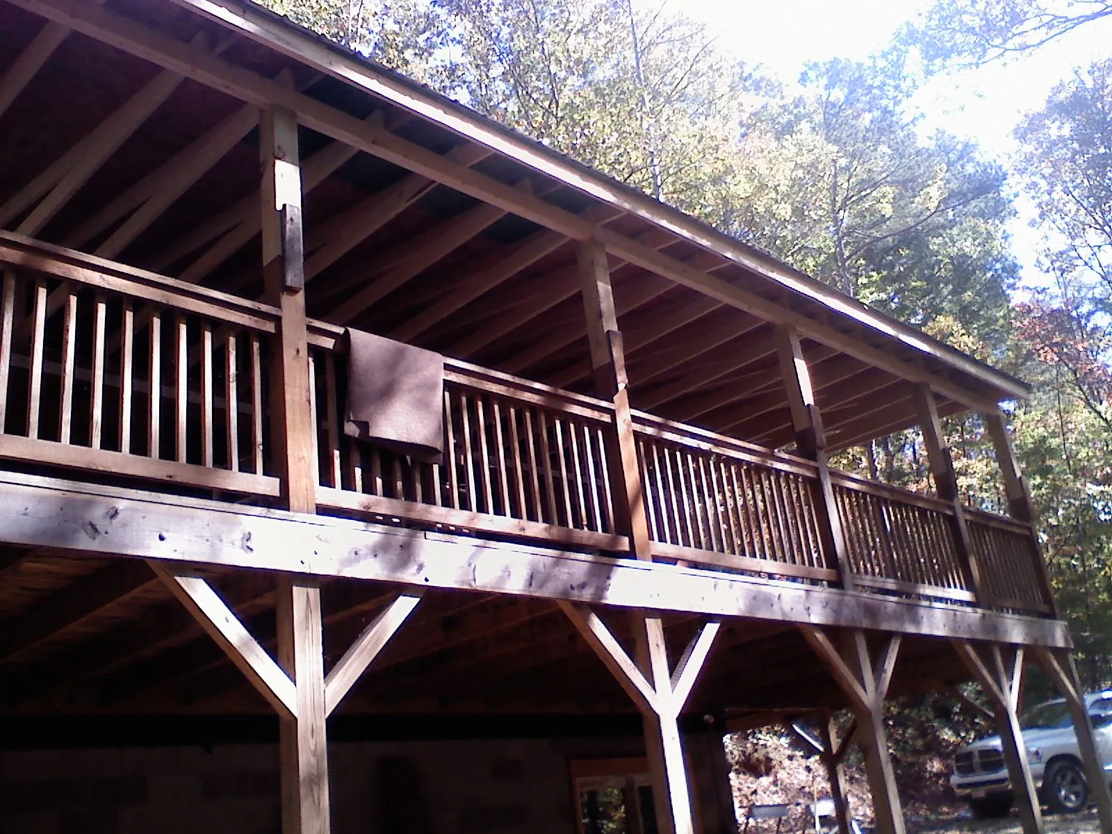 Timber framing under a new elevated porch and deck — Roof Leak Repair in Bonsall by Roofing Brothers